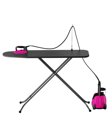 laurastar lift plus pinky pop portable steam generator in use on ironing board with steam cord holder