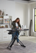 woman pressing quilt blocks with smart u in her sewing room